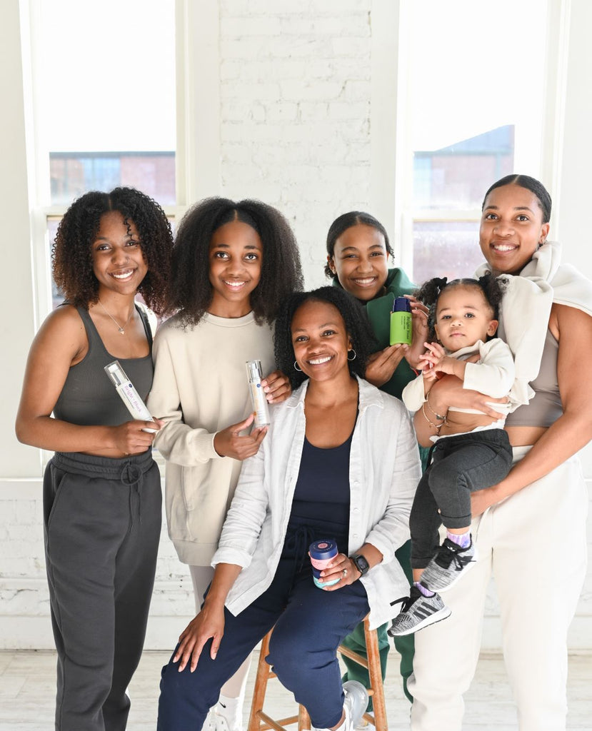 Three generations smiling with Bright Girl skincare