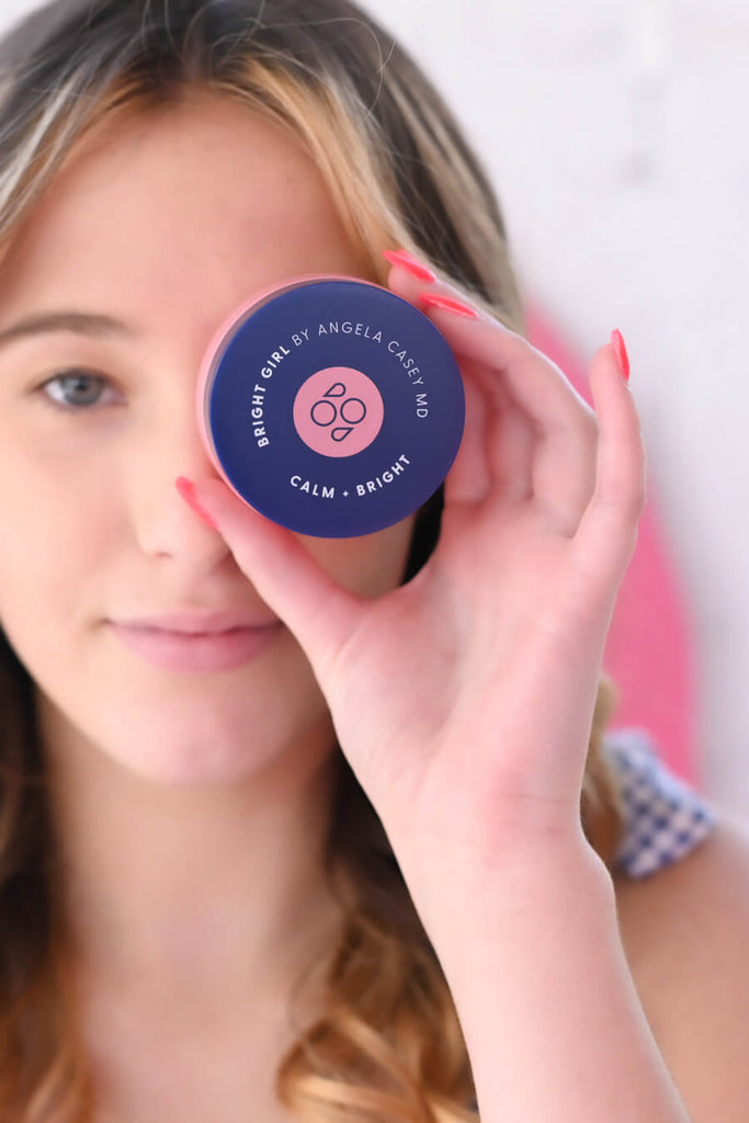 Teenager using Calm+Bright Calming Facial Mask
